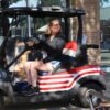 Donna Choi driving a golf cart
