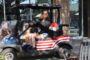 Donna Choi driving a golf cart