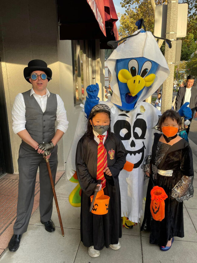 Purdy, Tim and two kids dressed as witches