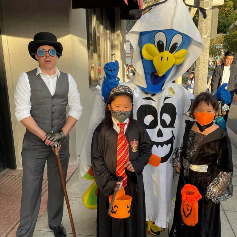 Purdy, Tim and two kids dressed as witches