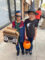 Two boys, one dressing as a rock-n-roller and the other one dressed as a warlock