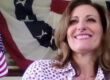 Downtown Arcadia video series showing a woman with long brown hair in front of a patriotic banner