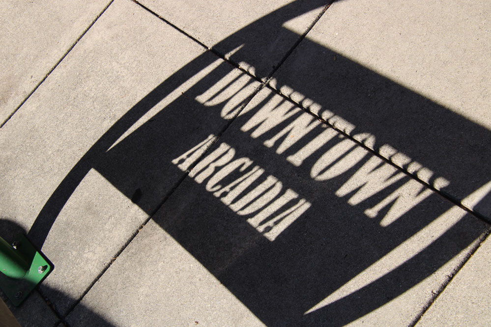 Downtown Arcadia word in a shadow reflection