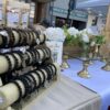 Jewelry on display on a table at a booth